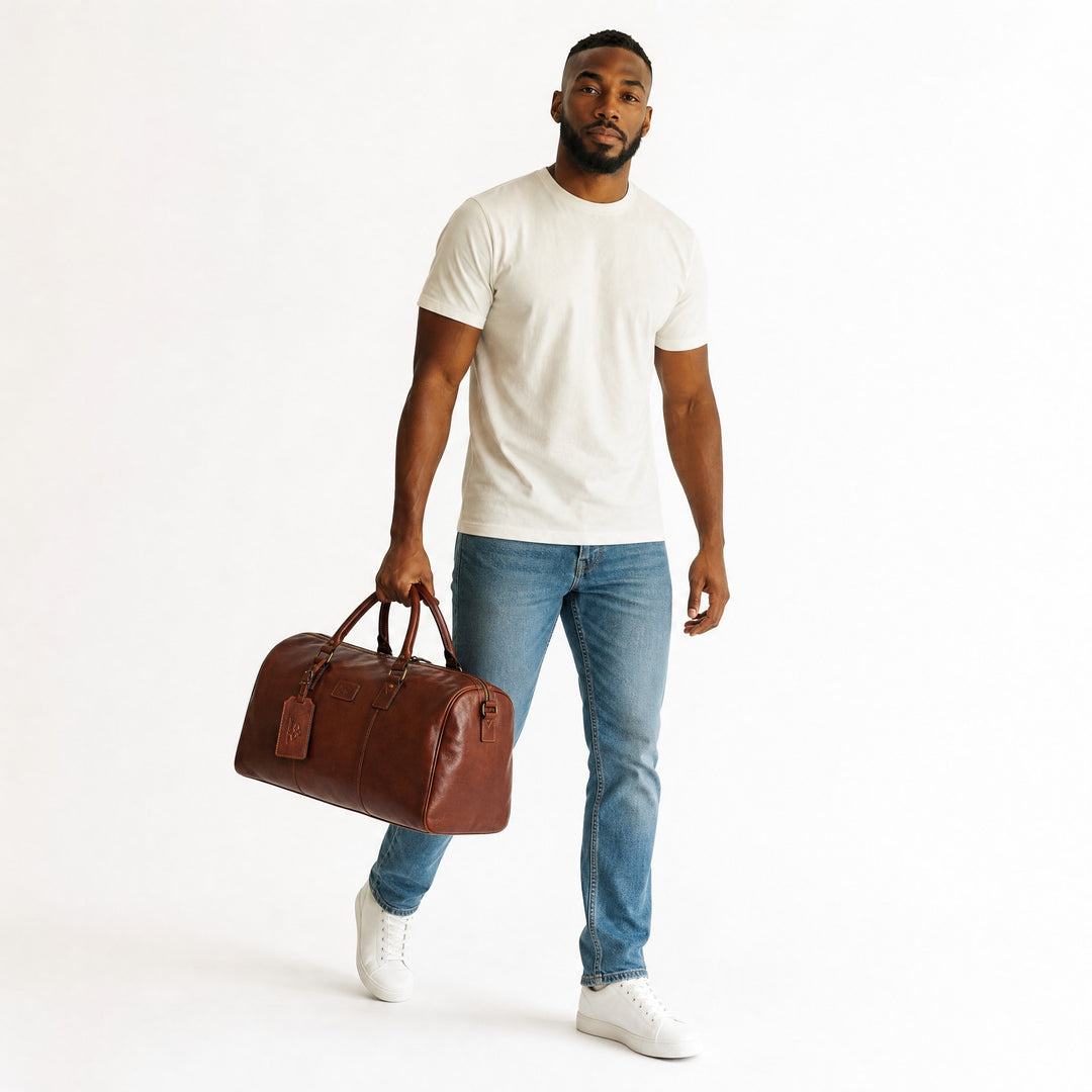 Chris Louis Amsterdam travel overnight bag in brown genuine veg-tan hide leather with top handles and detachable shoulder strap.