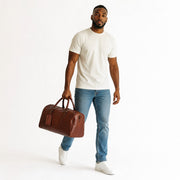 Chris Louis Amsterdam travel overnight bag in brown genuine veg-tan hide leather with top handles and detachable shoulder strap.