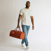 Chris Louis Amsterdam travel overnight bag in tan genuine veg-tan hide leather with top handles and detachable shoulder strap.