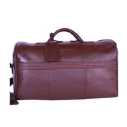 Chris Louis Ohrid Duffle Bag in brown genuine veg-tan hide leather with top handle and detachable shoulder strap.