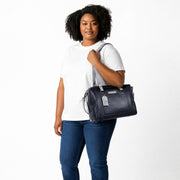 Chris Louis charcoal grey leather satchel handbag with light grey handles and shoulder strap, zip closure, and logo tag.