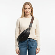 Chris Louis black full grain leather unisex explorer bum bag with multiple zippered compartments and adjustable strap.