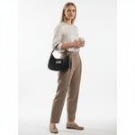 Chris Louis Fiona black faux leather shoulder bag with silver-tone hardware and curved silhouette.