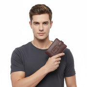 Chris Louis Giza Bifold Tab Wallet in rich brown genuine leather with contrast stitching and snap closure.