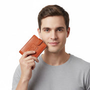 Chris Louis Giza Bifold wallet in warm tan genuine leather with snap closure and embossed logo.