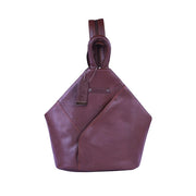 Chris Louis Jarrah brown genuine veg-tan leather hexagon shoulder bag with adjustable straps and front zipper pocket.