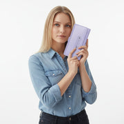 Chris Louis lavender leather trifold wallet with RFID-blocking technology and multiple card slots.