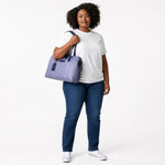 Chris Louis light grey leather satchel bag with navy blue accents and silver hardware. Features dual handles and a detachable shoulder strap.