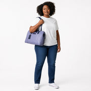 Chris Louis light grey leather satchel bag with navy blue accents and silver hardware. Features dual handles and a detachable shoulder strap.