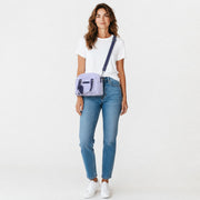 Chris Louis light grey leather satchel handbag with navy blue accents and adjustable strap.