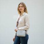 Chris Louis Moolicious grey full grain leather sling bag with webbed strap, adjustable and detachable.