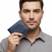 Chris Louis navy blue genuine leather bifold wallet with embossed logo, held by a man.