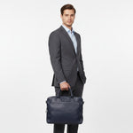 Chris Louis navy blue genuine leather office bag with top handles and detachable shoulder strap, 15-inch laptop compartment.