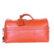 Chris Louis Ohrid duffle bag in tan genuine veg-tan hide leather with top handle and detachable shoulder strap.