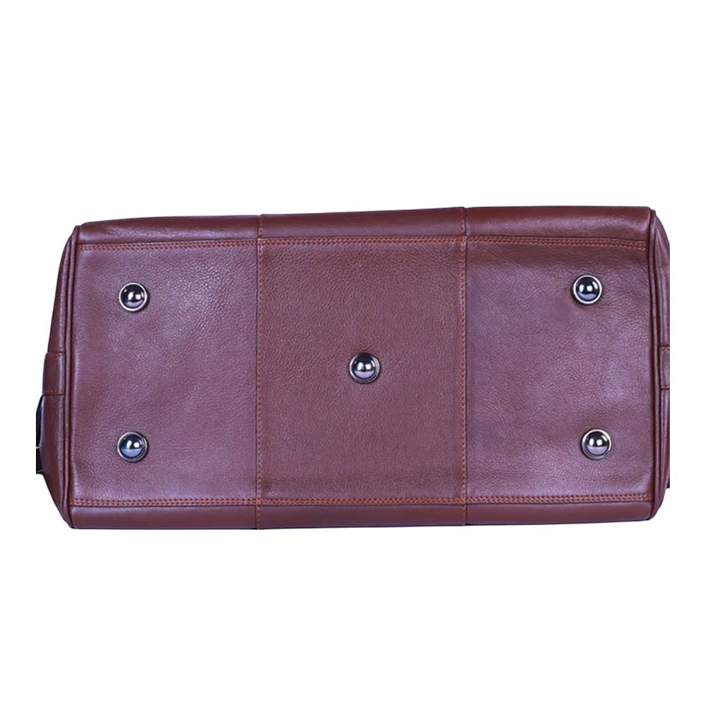 Chris Louis Ohrid Duffle Bag in brown genuine veg-tan hide leather with metal hardware and protective feet.