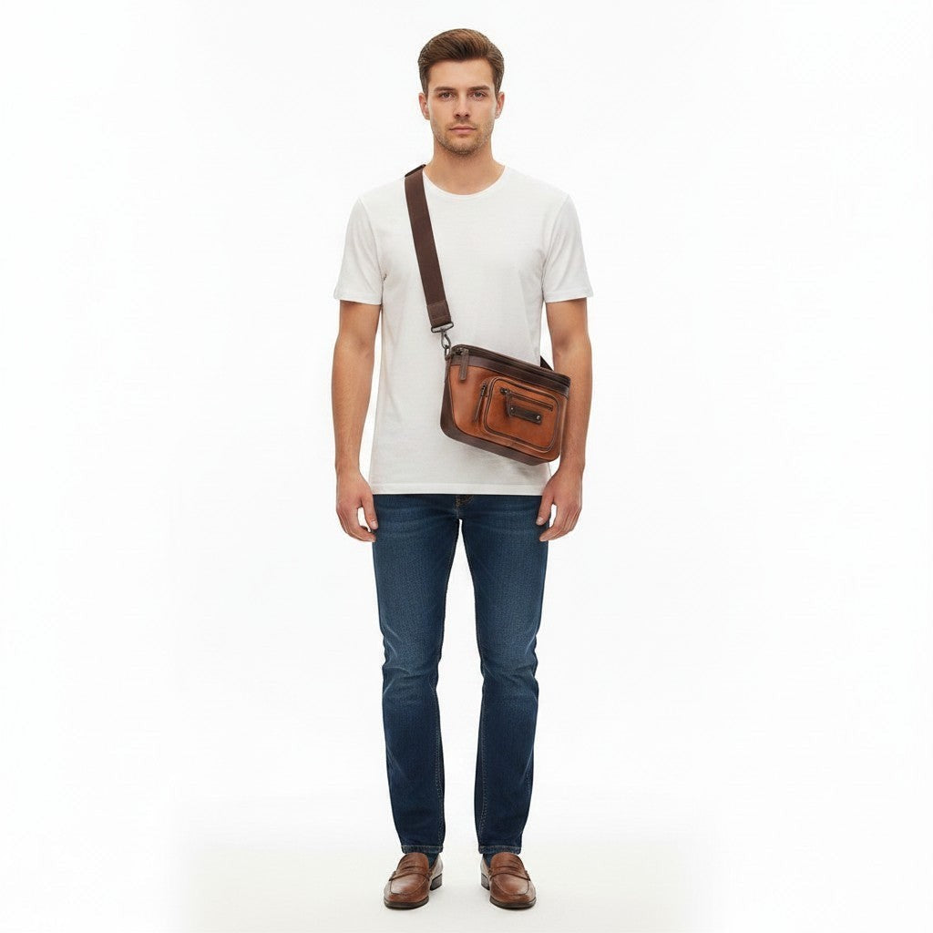 Chris Louis Olyia unisex tan/brown full grain leather pouch bag with multiple zipper compartments.