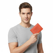 Chris Louis genuine leather bifold wallet in warm orange with debossed logo and RFID protection.