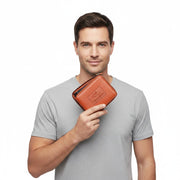 Chris Louis orange leather zip-around wallet with embossed logo and RFID blocking technology.
