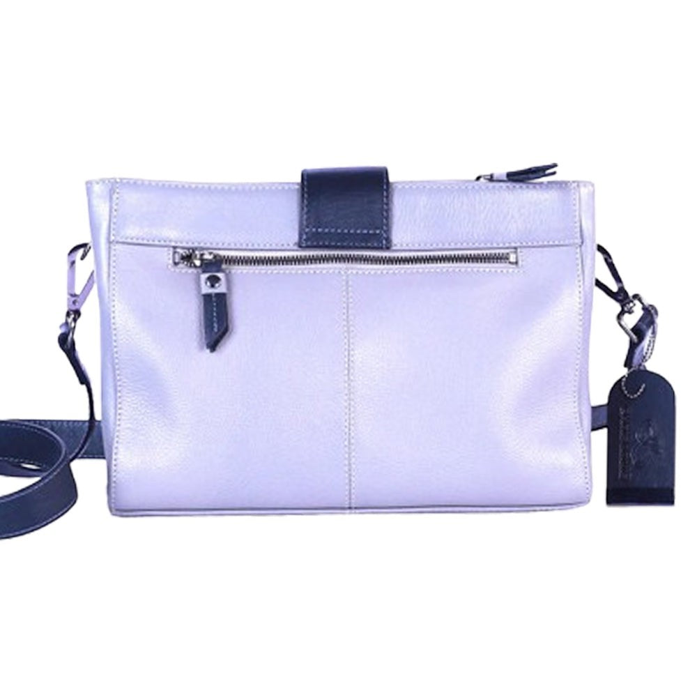 Chris Louis Santorini leather crossbody bag in light purple with navy accents and adjustable strap.