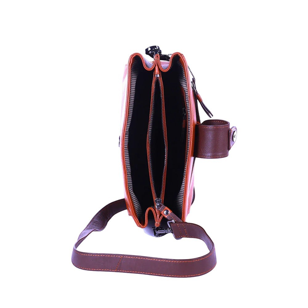 Chris Louis Santorini tan leather crossbody bag with front flap and metal hardware. Detachable strap.