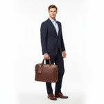 Chris Louis Stonehenge brown genuine veg-tan hide leather office bag with top handle and detachable shoulder strap.