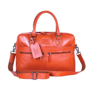 Chris Louis tan leather briefcase with top handles and detachable shoulder strap. Features exterior zip pockets.