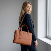 Chris Louis tan leather executive 2-in-1 bag with detachable laptop case and shoulder strap.