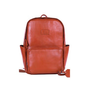 Chris Louis Wollaby backpack in tan genuine leather with multiple pockets and laptop compartment.